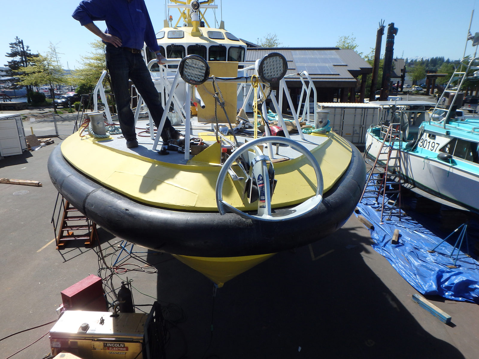  Mark, our boatyard manager overseeing the installation of the new Anchor winch. 
